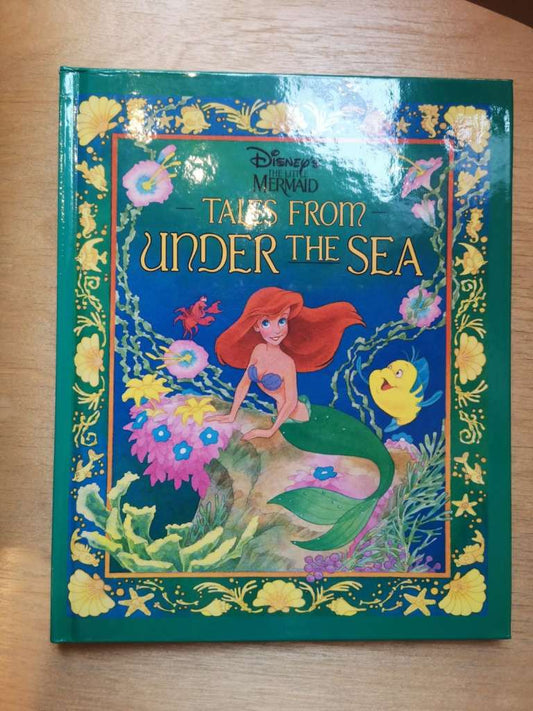 Disney's the Little Mermaid: Tales from Under the Sea Hardcover – January 1, 1991 by Fred Marvin (Illustrator)