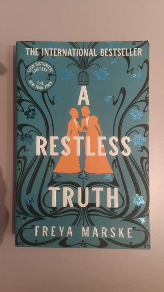 A Restless Truth : A magical, sapphic locked-room murder mystery by Freya Marske